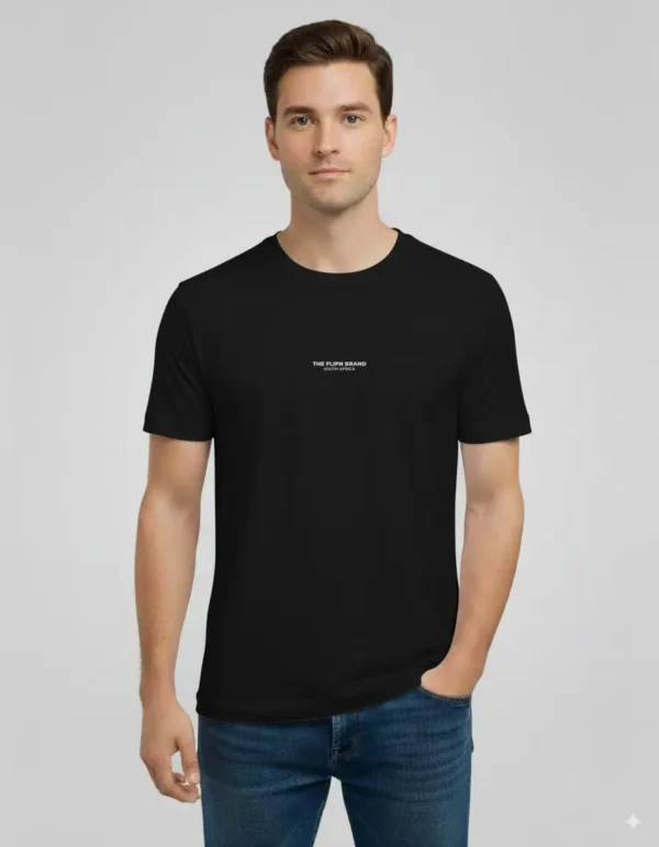 Male model wearing a black FLIPN t-shirt with minimalist logo text, paired with blue jeans.