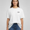 "Female model wearing a white unisex FLIPN graphic t-shirt with small black and red logo text on the chest, paired with blue jeans."