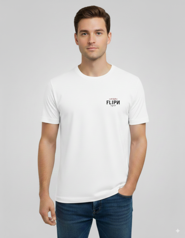 "Male model wearing a white unisex FLIPN graphic t-shirt with small black and red logo text on the chest, paired with blue jeans."